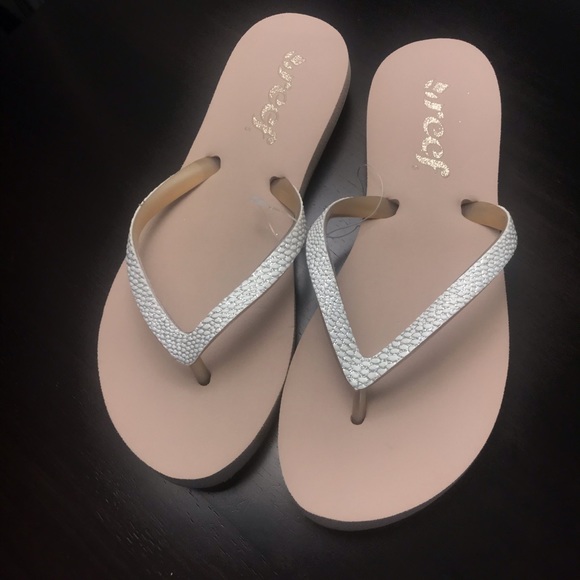 reef silver flip flops